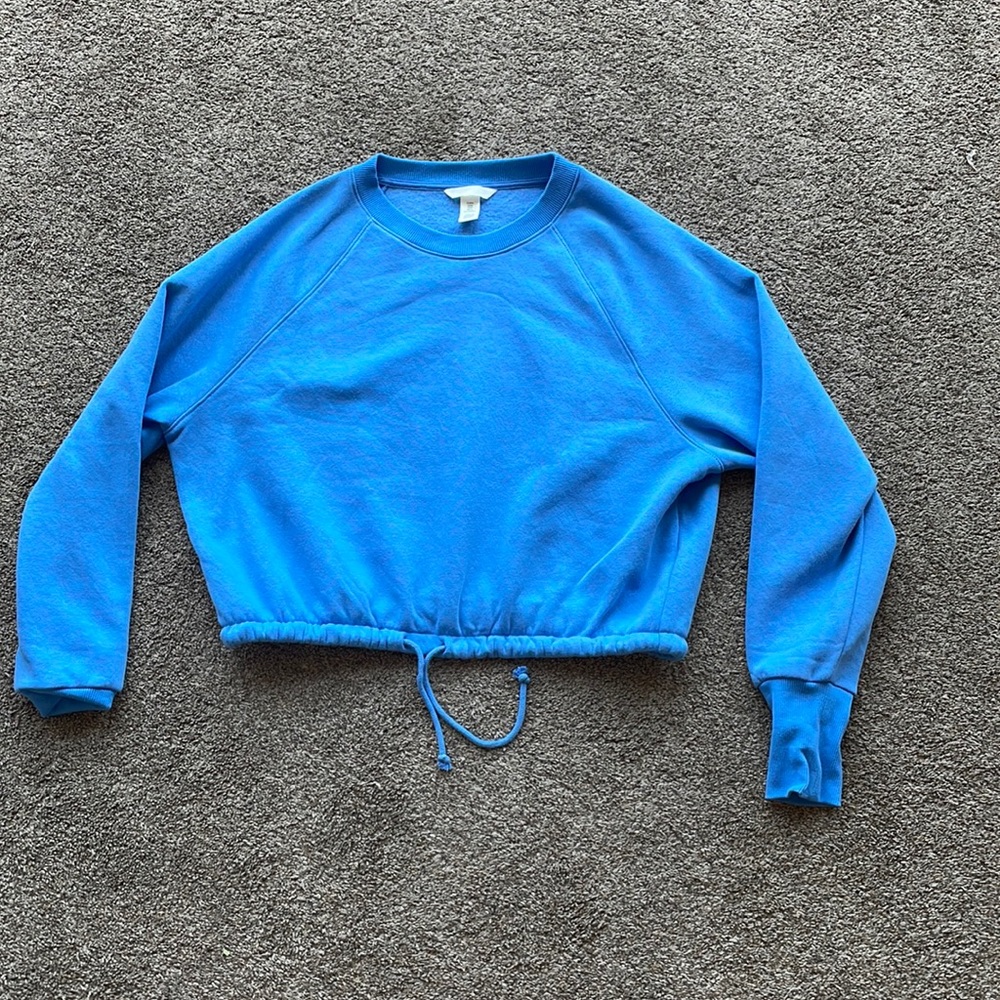 H&M’s light blue drawstring sweatshirt